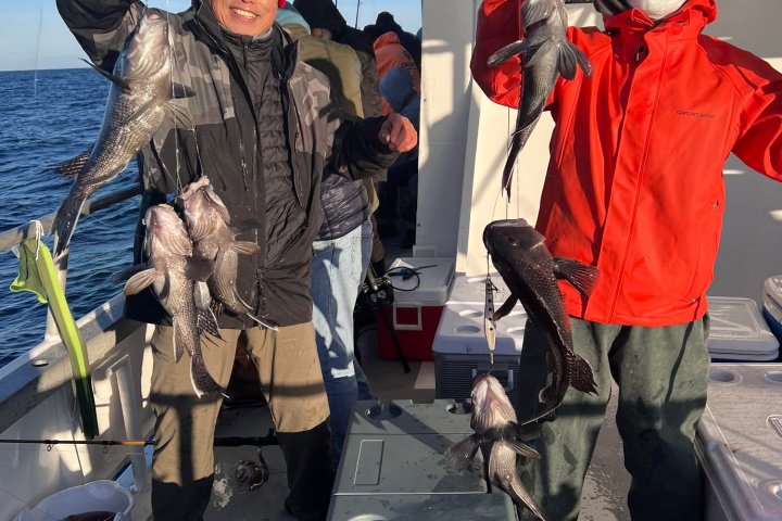 a group of people standing around each other