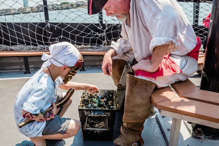 a group of people sitting on a bench