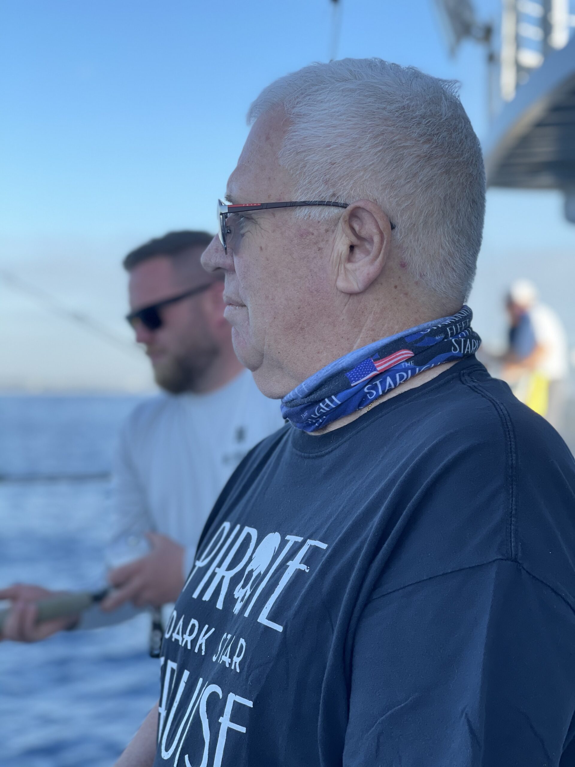 a man looking at the water