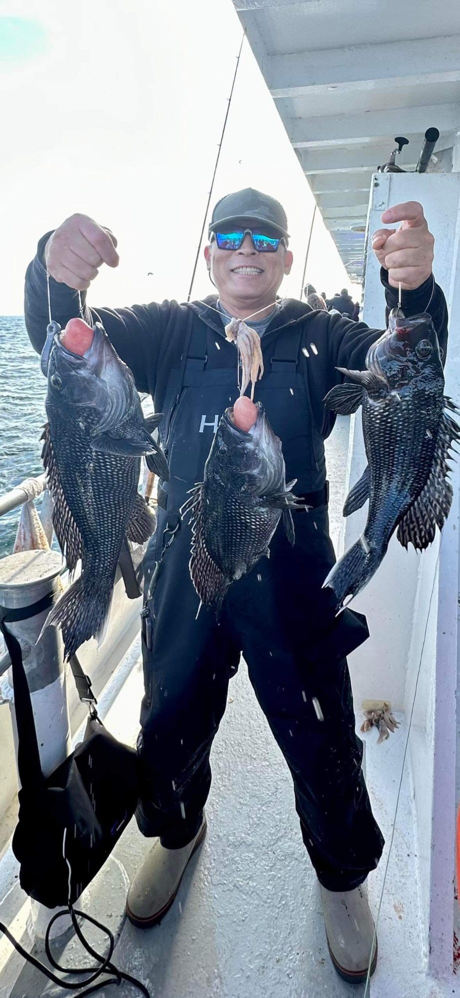 Seabass9dec2023 a person holding a fish