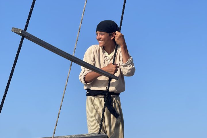 a group of people on a swing